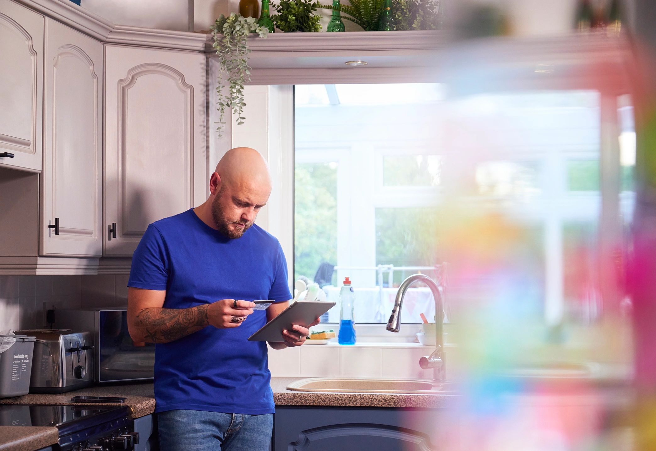 Professional reviewing property information on a tablet