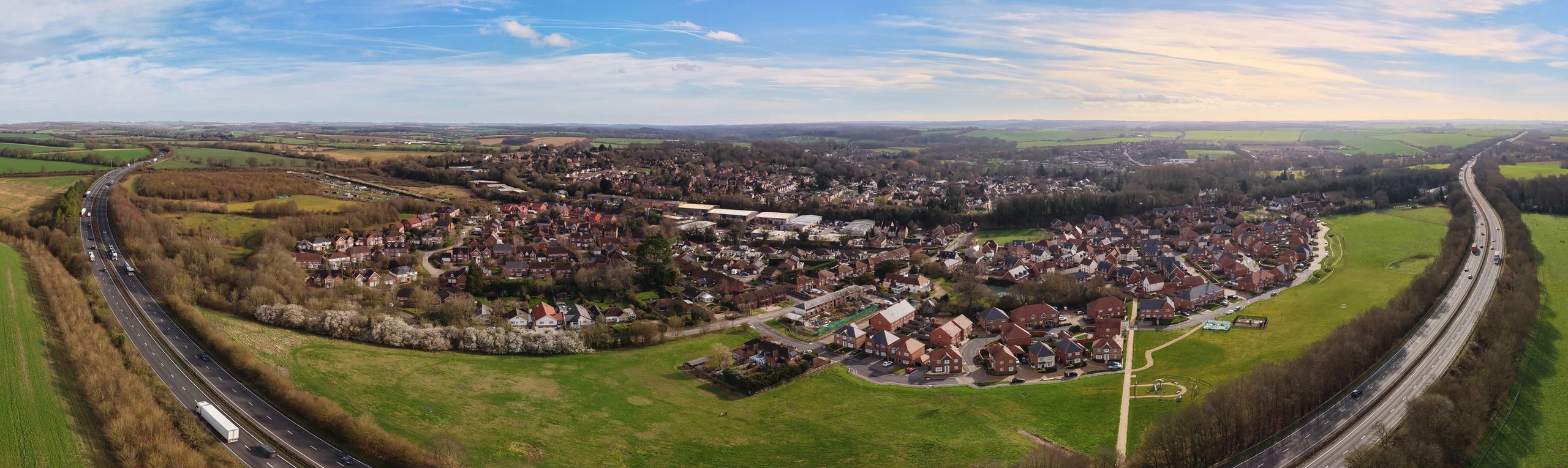 Aerial panorama of a UK town and surrounding countryside